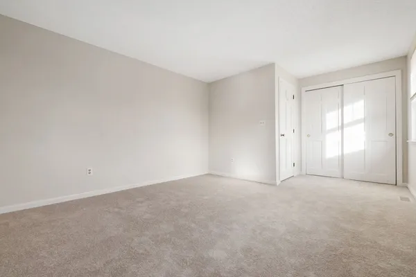 a view of a hallway with staircase