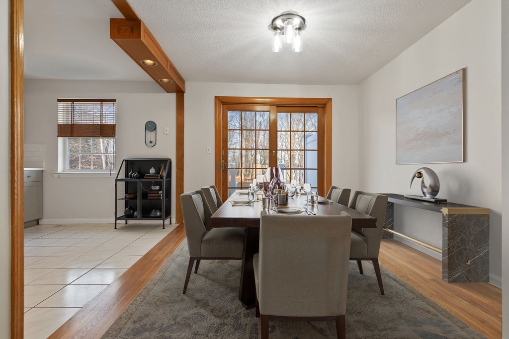 320 Newbury Street, Unit 304 Danvers, MA 01923 - Photo 7 of 32 a dining room with furniture and window