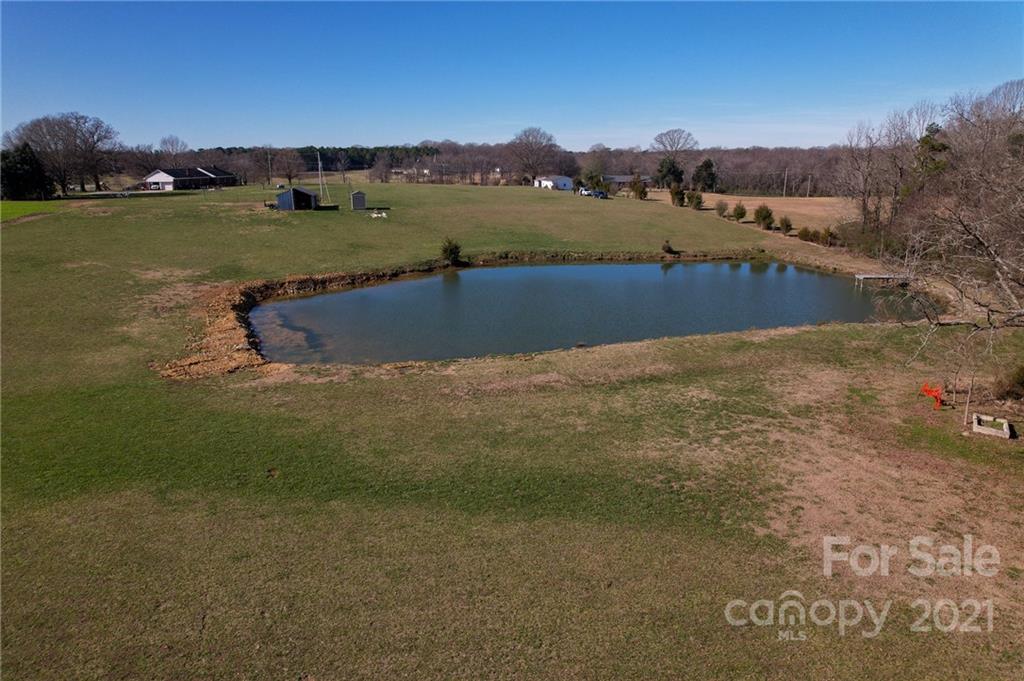4515 Belk Mill Road Monroe, NC 28112 - Photo 12 of 12 a view of lake with houses