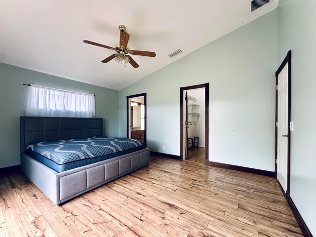 a living room with couch and window