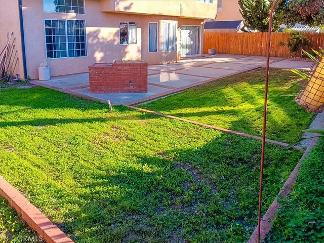 a view of a backyard with plants