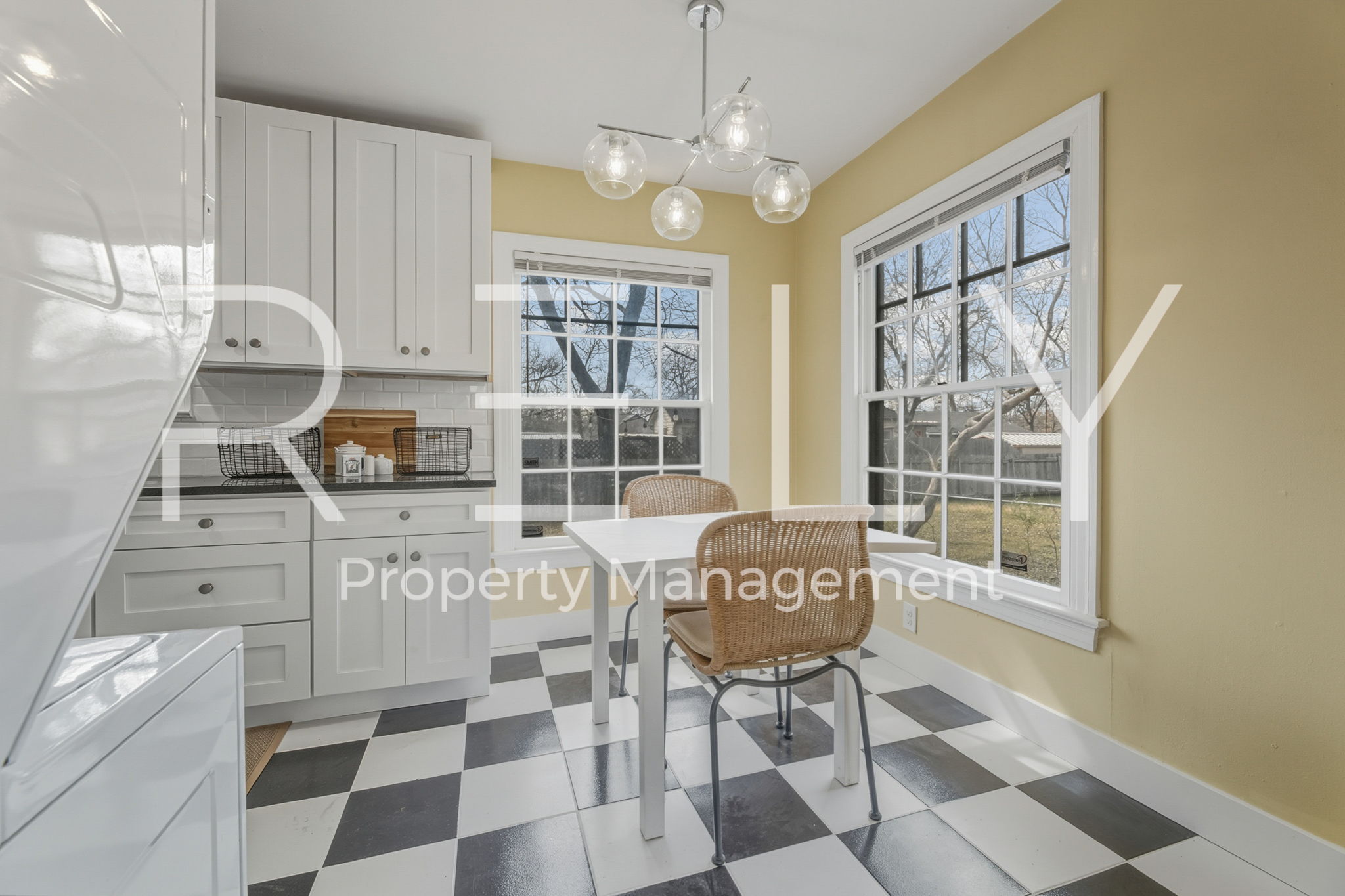 933 East 56th 1/2 Street Austin, TX 78751 - Photo 13 of 37 a view of a dining room with furniture and a window