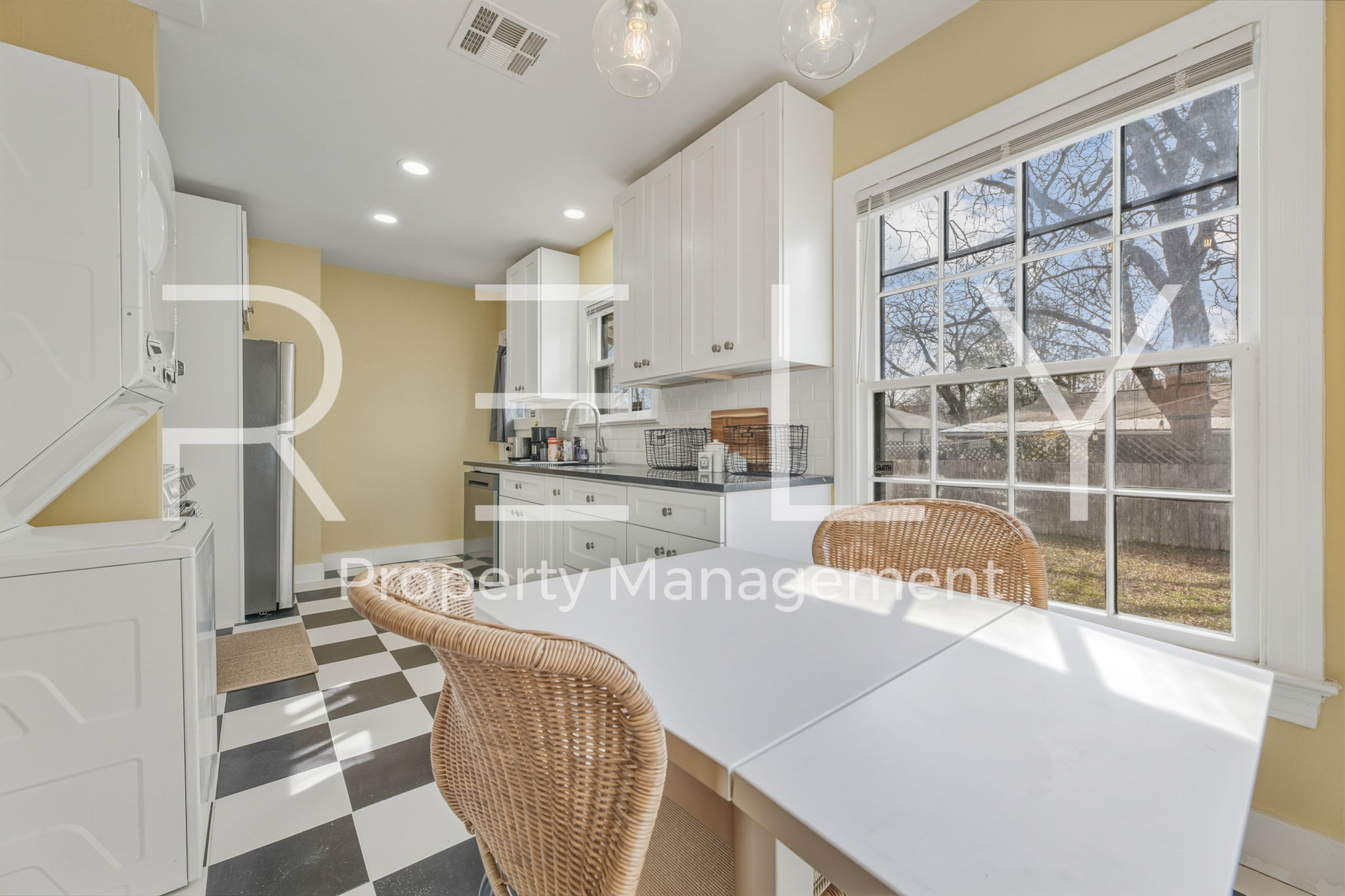 933 East 56th 1/2 Street Austin, TX 78751 - Photo 17 of 37 a living room with furniture and a large window