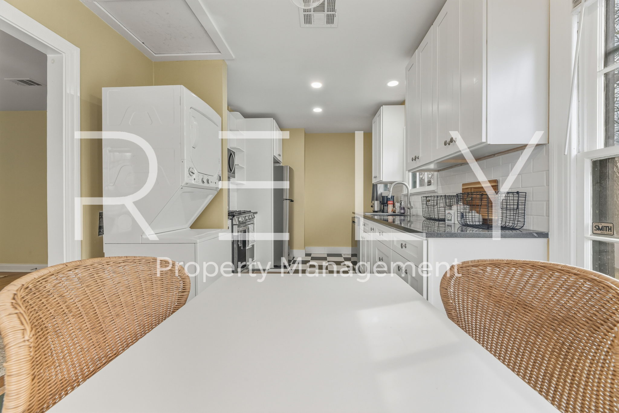 933 East 56th 1/2 Street Austin, TX 78751 - Photo 19 of 37 a lobby with a couch and stairs