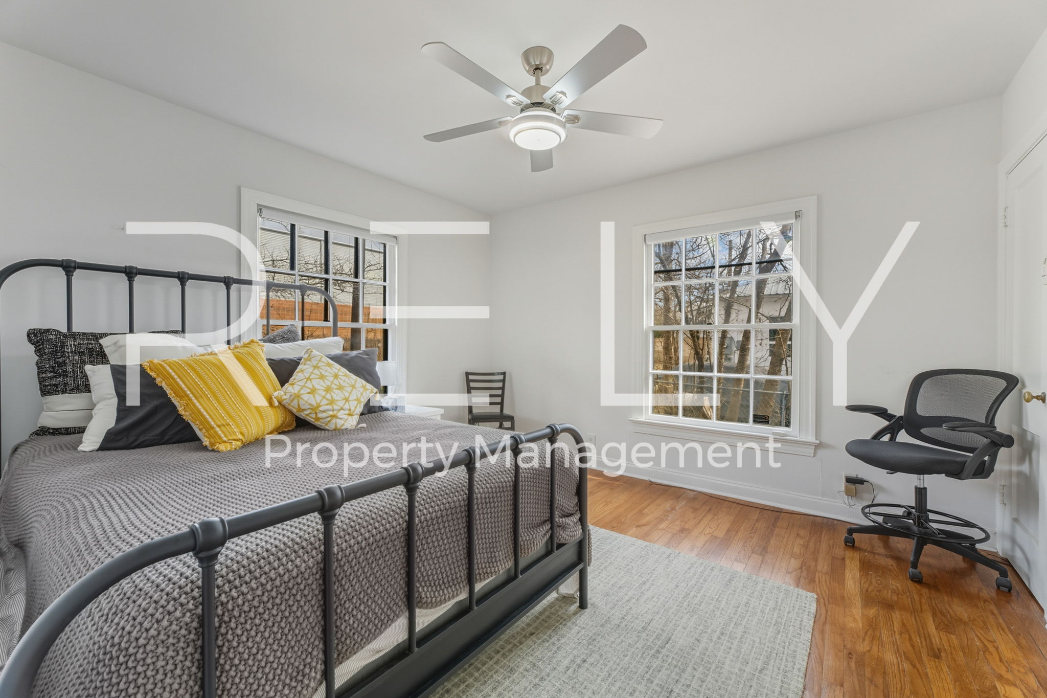 933 East 56th 1/2 Street Austin, TX 78751 - Photo 25 of 37 a living room with furniture and wooden floor