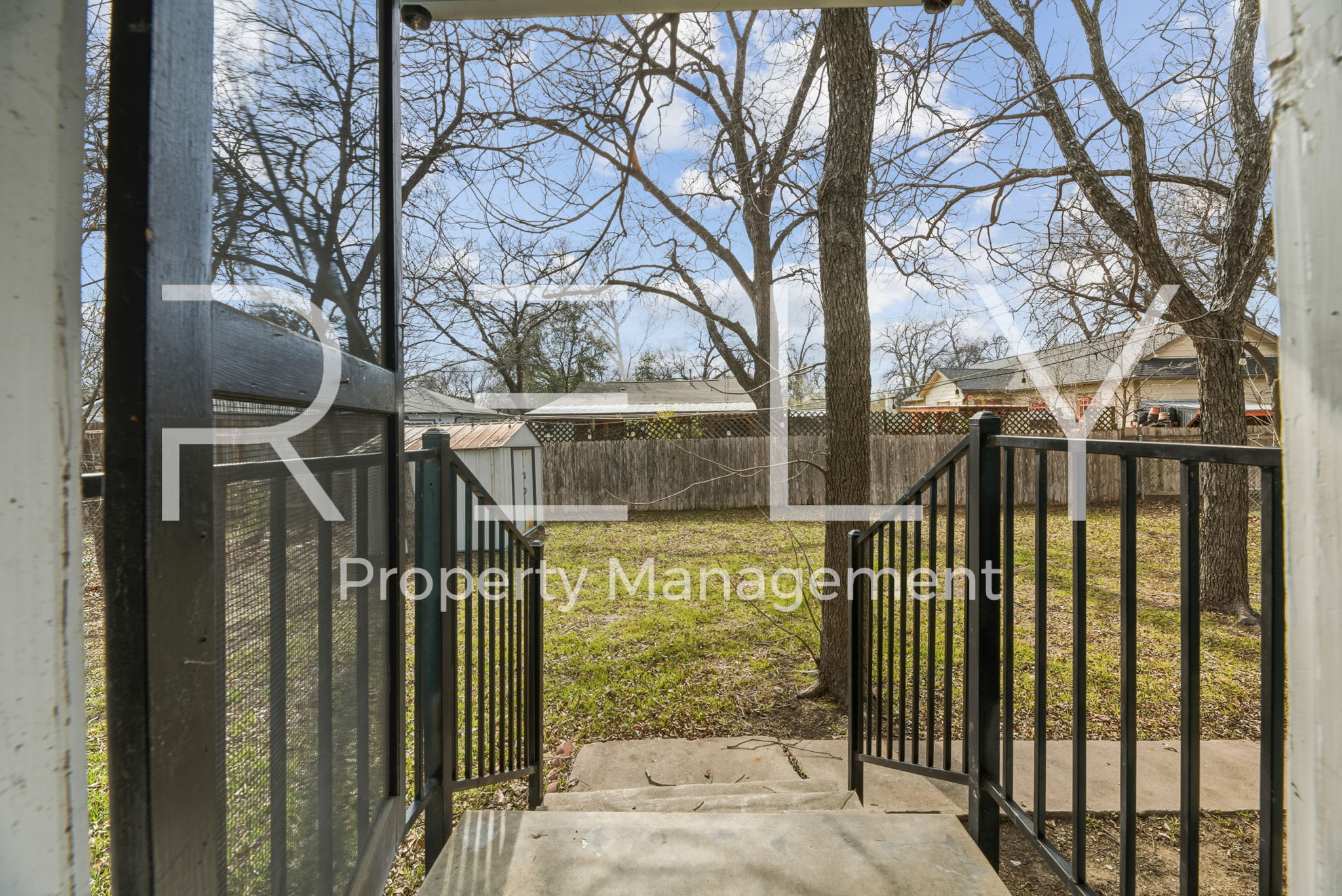 933 East 56th 1/2 Street Austin, TX 78751 - Photo 32 of 37 a view of a house with a tree