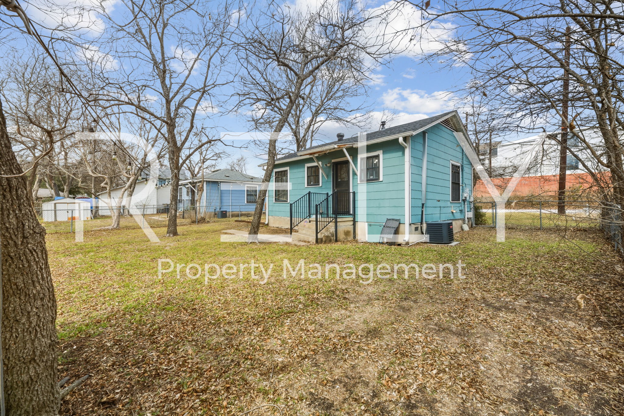 933 East 56th 1/2 Street Austin, TX 78751 - Photo 34 of 37 a view of a house with a yard