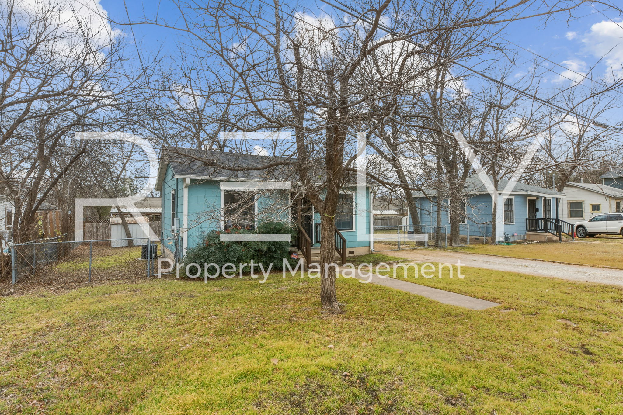 933 East 56th 1/2 Street Austin, TX 78751 - Photo 4 of 37 a front view of a house with a yard