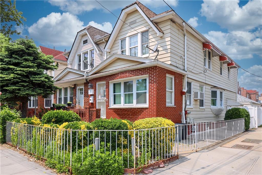 5723 Ave. M Brooklyn, NY 11234 - Photo 1 of 28 a front view of a house with a garden