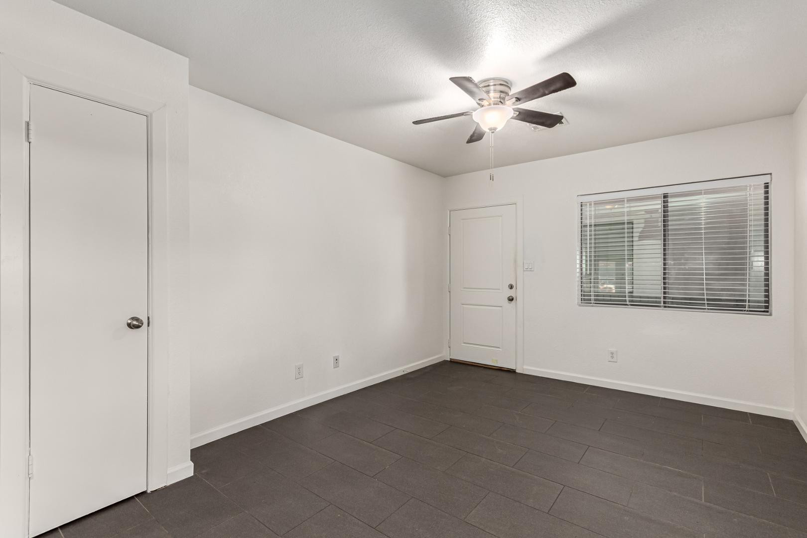 3034 North 35th Street, Unit 3 Phoenix, AZ 85018 - Photo 5 of 10 a view of an empty room with a window