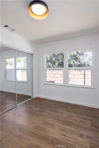 a view of room with cabinet and empty racks