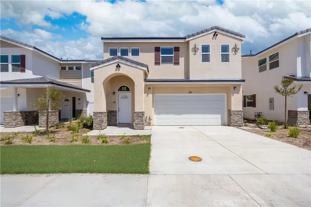 a front view of a house with entertaining space