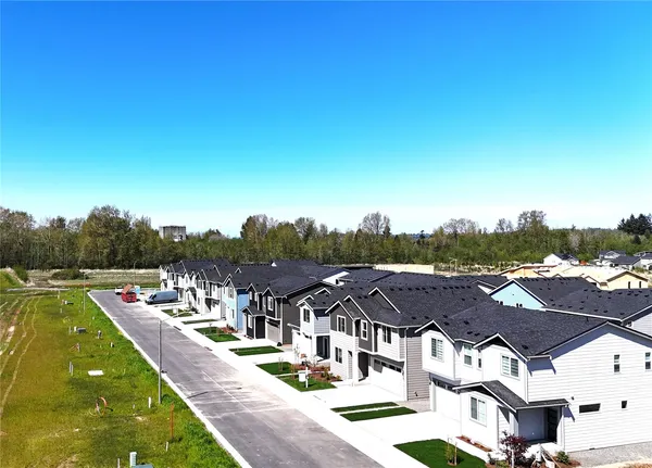 a view of a house with a big yard