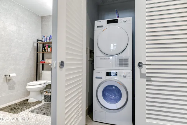 a bathroom with a toilet and a sink