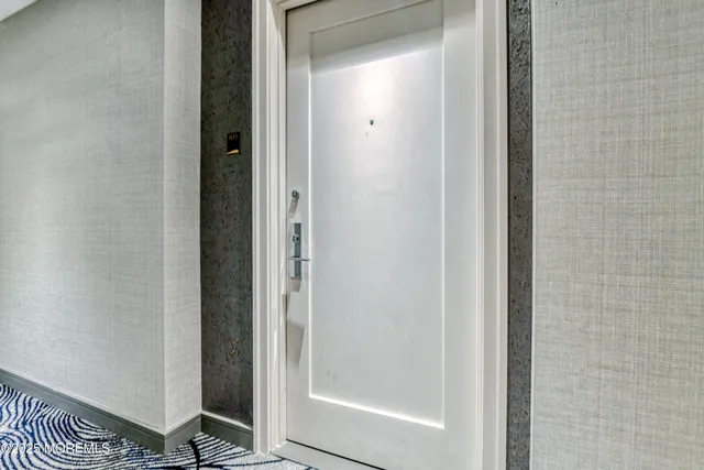 a bathroom with a glass door