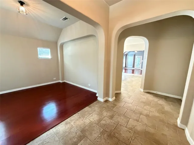 an empty room with windows