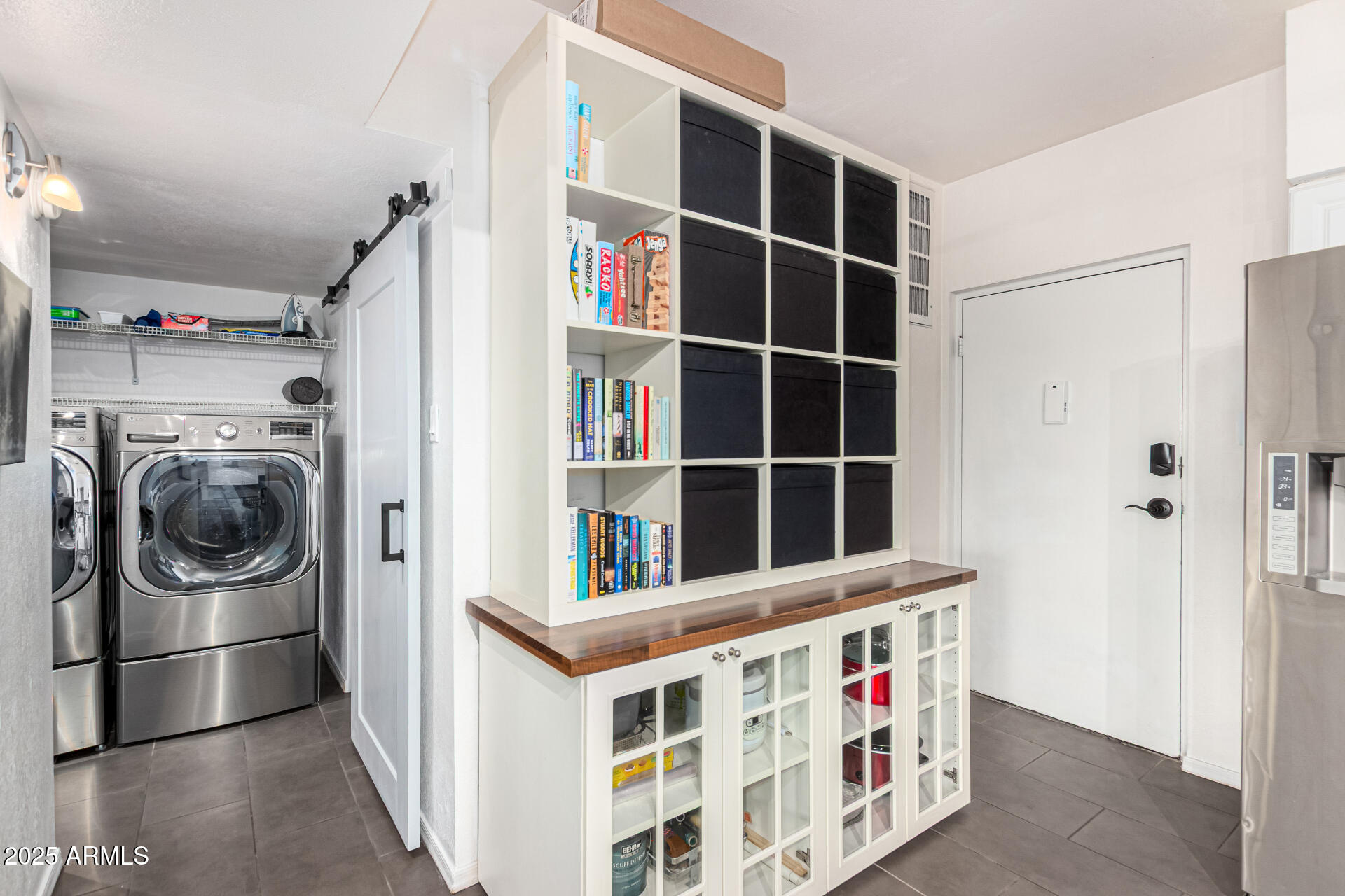 351 East Thomas Road, Unit D505 Phoenix, AZ 85012 - Photo 23 of 28 a view of utility room with washer and dryer