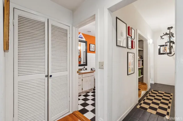 a view of a livingroom with furniture and a window