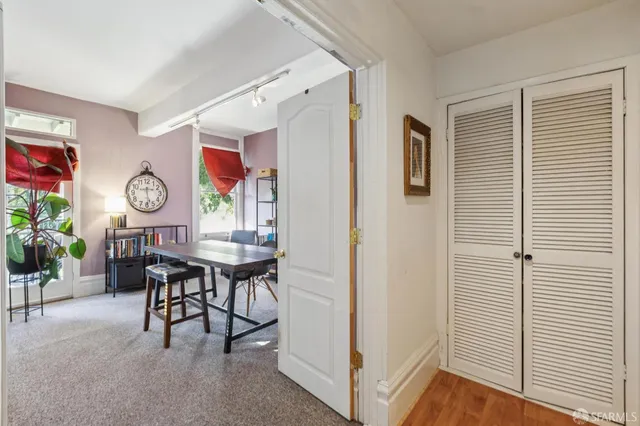 a view of a table and chairs in a room