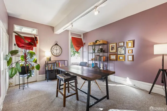 a view of a dining room with furniture
