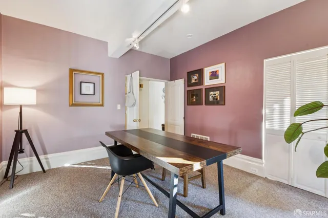 a bathroom with a shower and a sink