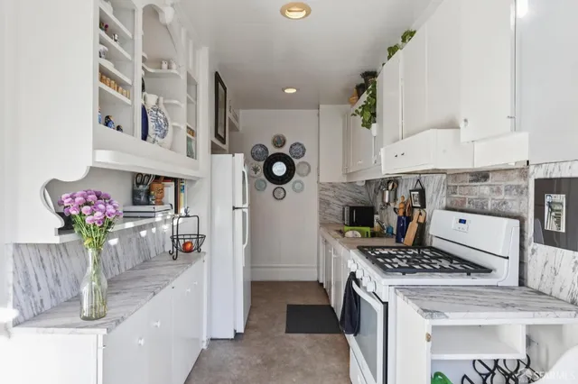 a bathroom with a window and a shower