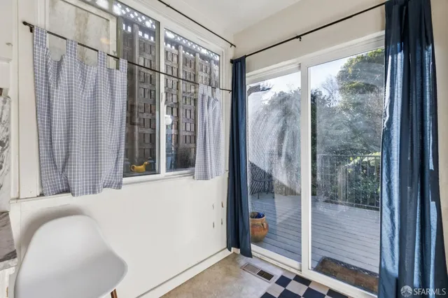 a view of entryway with wooden floor