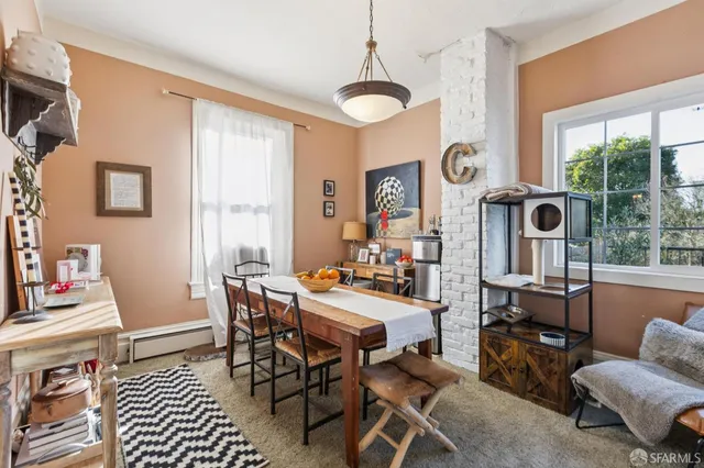 a kitchen with stainless steel appliances granite countertop a refrigerator and a stove