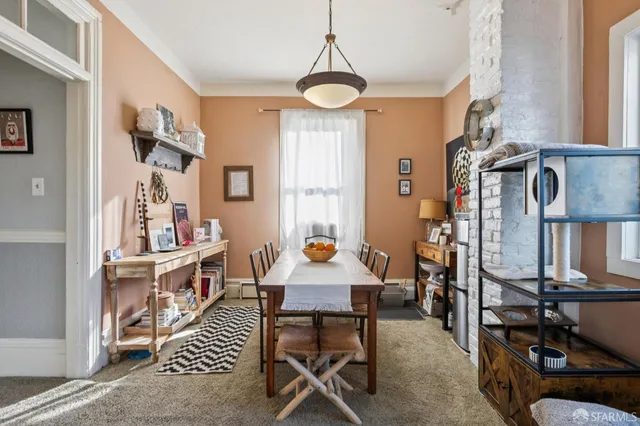 a white refrigerator freezer sitting inside of a kitchen
