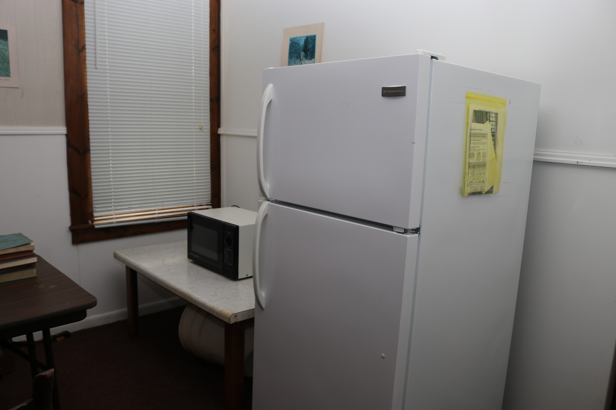9 Flintville School Road Flintville, TN 37335 - Photo 12 of 12 a white refrigerator freezer sitting next to a window