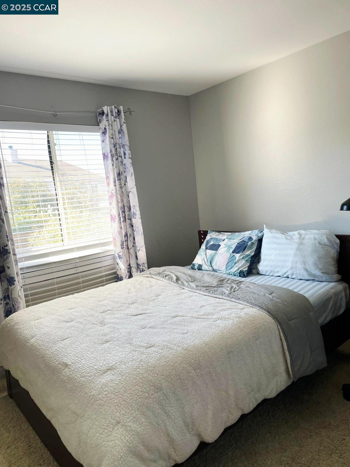 5224 Cedar Ridge Way Antioch, CA 94531 - Photo 5 of 5 a bedroom with a bed and a window