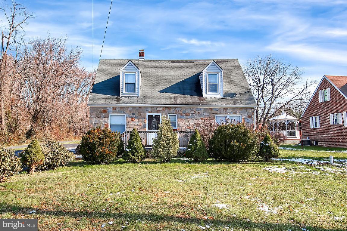 333 Back River Neck Road Baltimore, MD 21221 - Photo 19 of 25 a view of a house with a yard