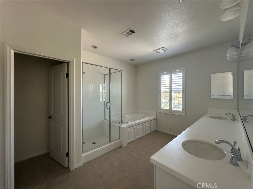 3632 La Fiesta Drive Brea, CA 92823 - Photo 5 of 6 a bathroom with a tub sink and glass door