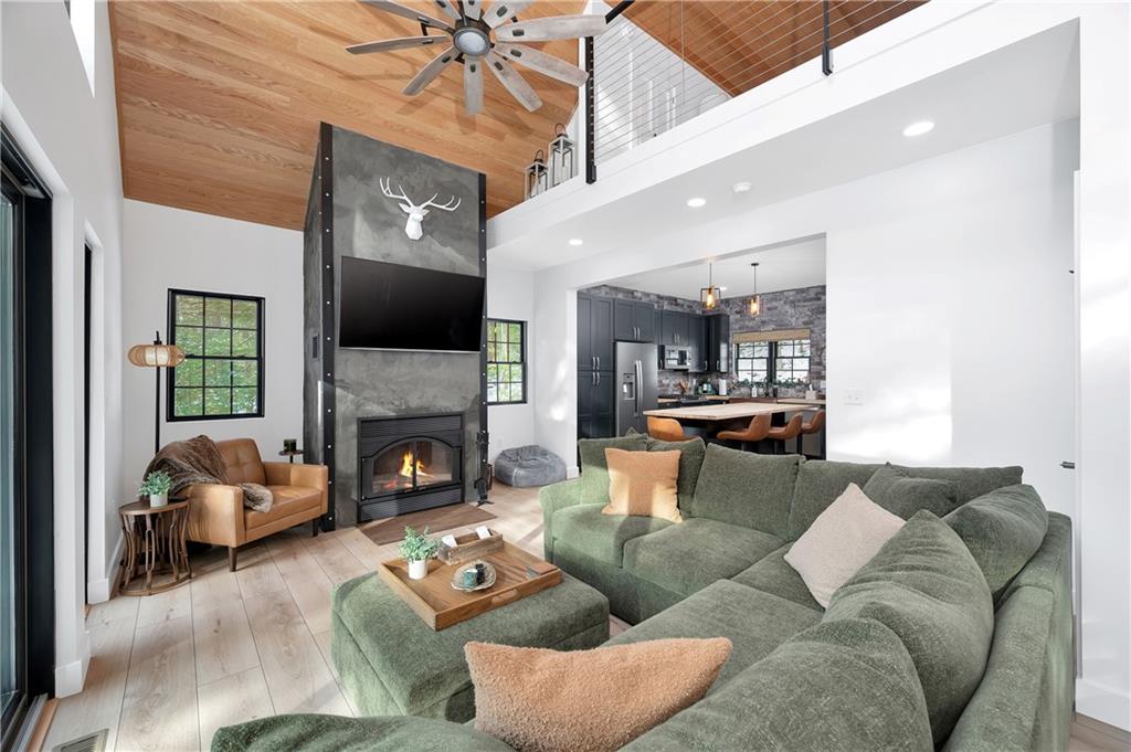 162 East Maple Lane Clarion, PA 16214 - Photo 14 of 49 a living room with furniture and a fireplace