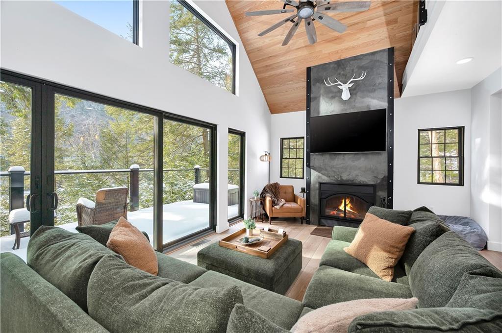 162 East Maple Lane Clarion, PA 16214 - Photo 15 of 49 a living room with furniture a large window and a flat screen tv
