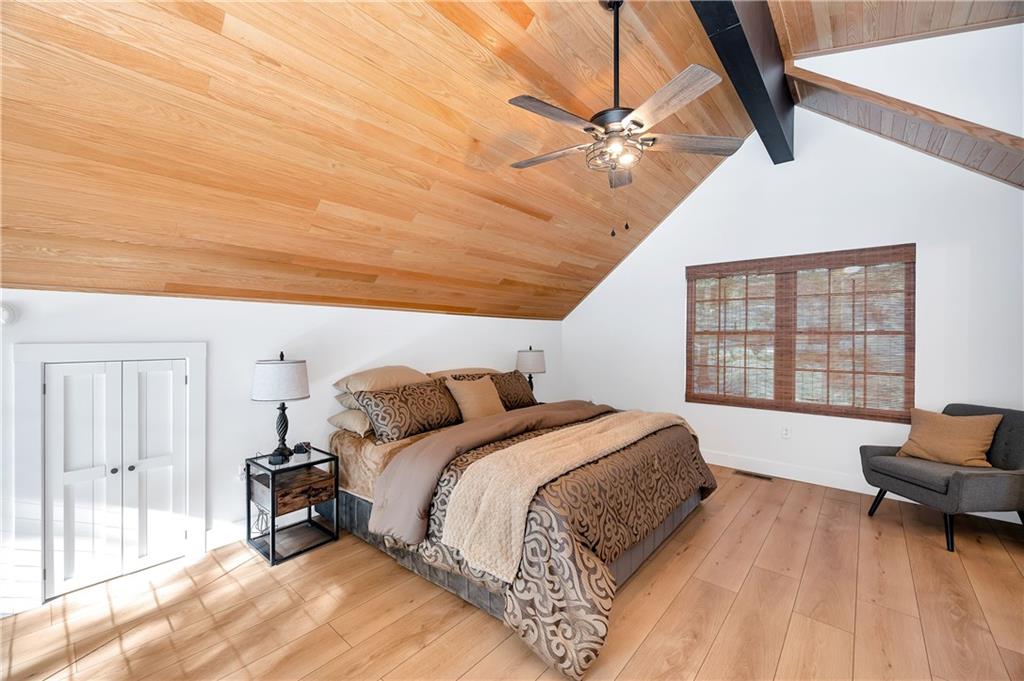 162 East Maple Lane Clarion, PA 16214 - Photo 24 of 49 a bedroom with a bed a couch and dresser