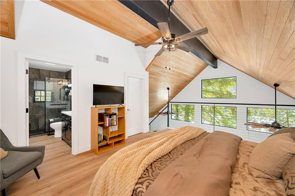 162 East Maple Lane Clarion, PA 16214 - Photo 25 of 49 a bedroom with a large bed and a flat screen tv