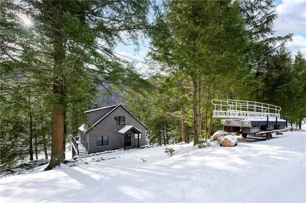 a car parked in front of a house