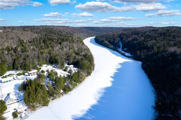 a view of a lake with a mountain in the background
