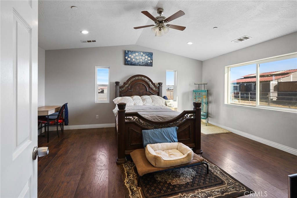 7755 7th Street Phelan, CA 92371 - Photo 16 of 27 a living room with furniture and a window