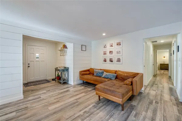a view of a backyard with furniture and a slide