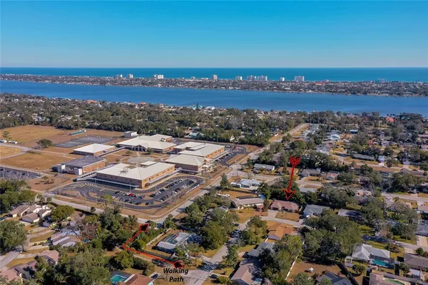 an aerial view of a city with lots of residential buildings