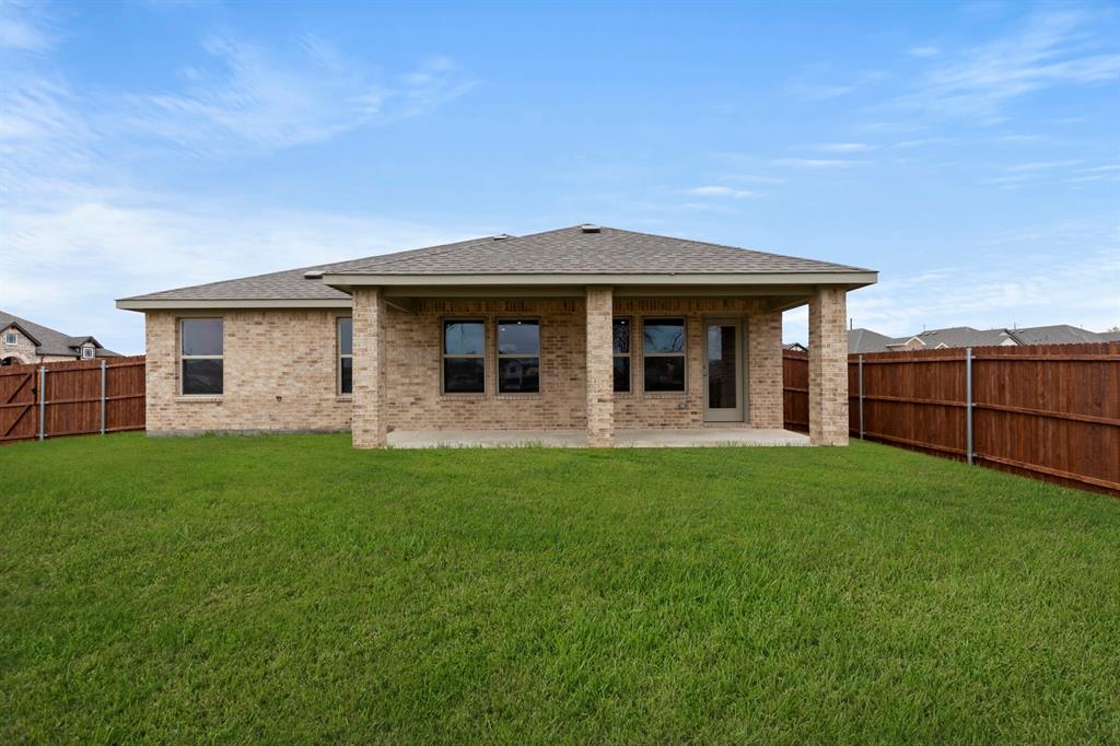 1120 Rushing Court Aubrey, TX 76227 - Photo 26 of 27 a front view of a house with yard