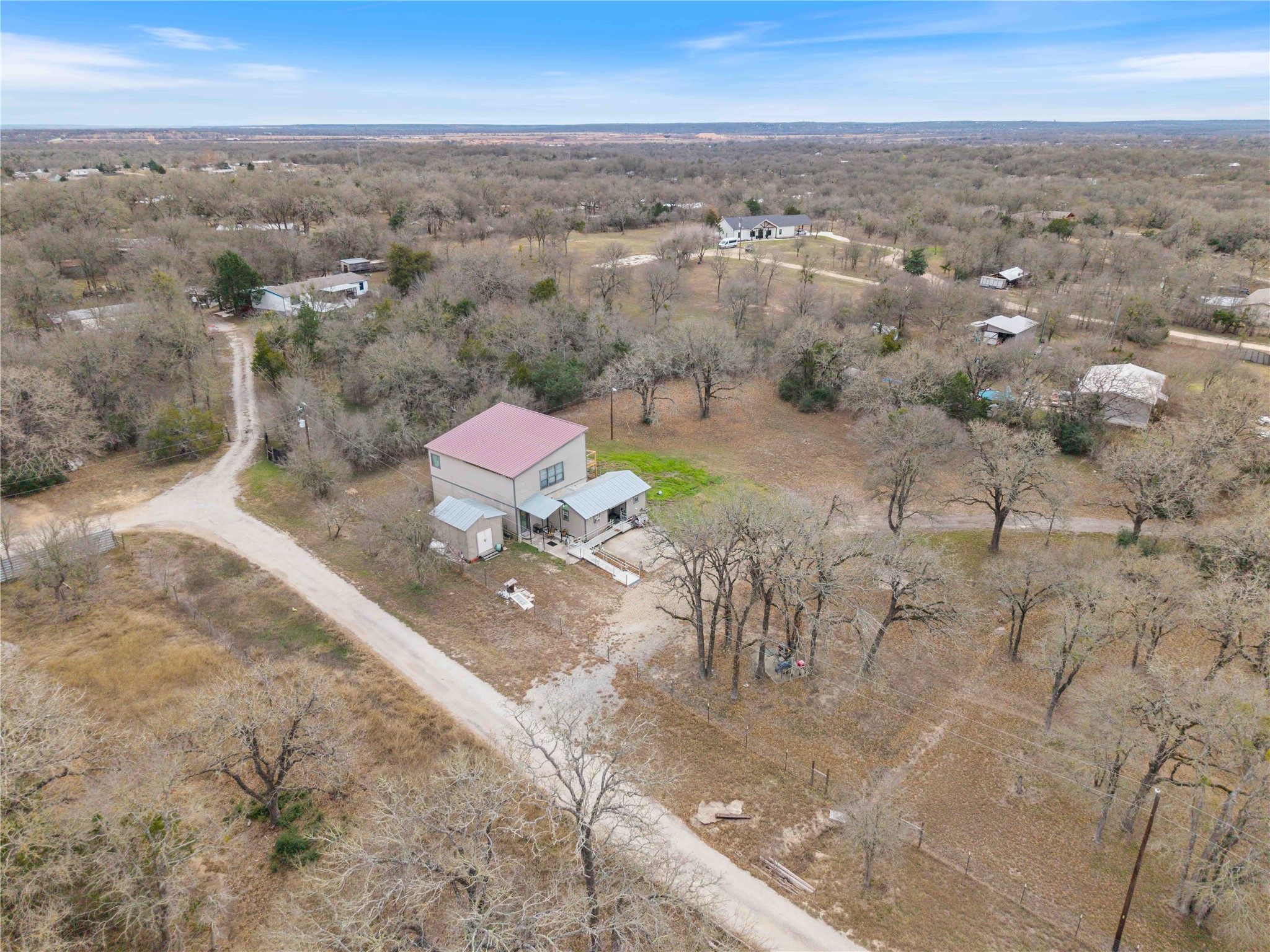 211 Webberwood Way Elgin, TX 78621 - Photo 2 of 9 an aerial view of a houses with a yard
