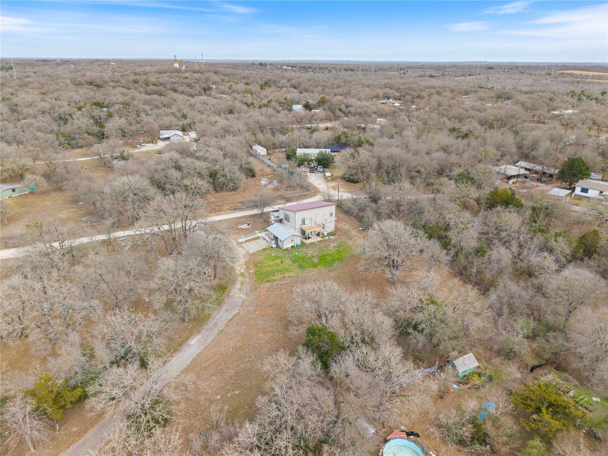211 Webberwood Way Elgin, TX 78621 - Photo 3 of 9 an aerial view of a houses with a yard