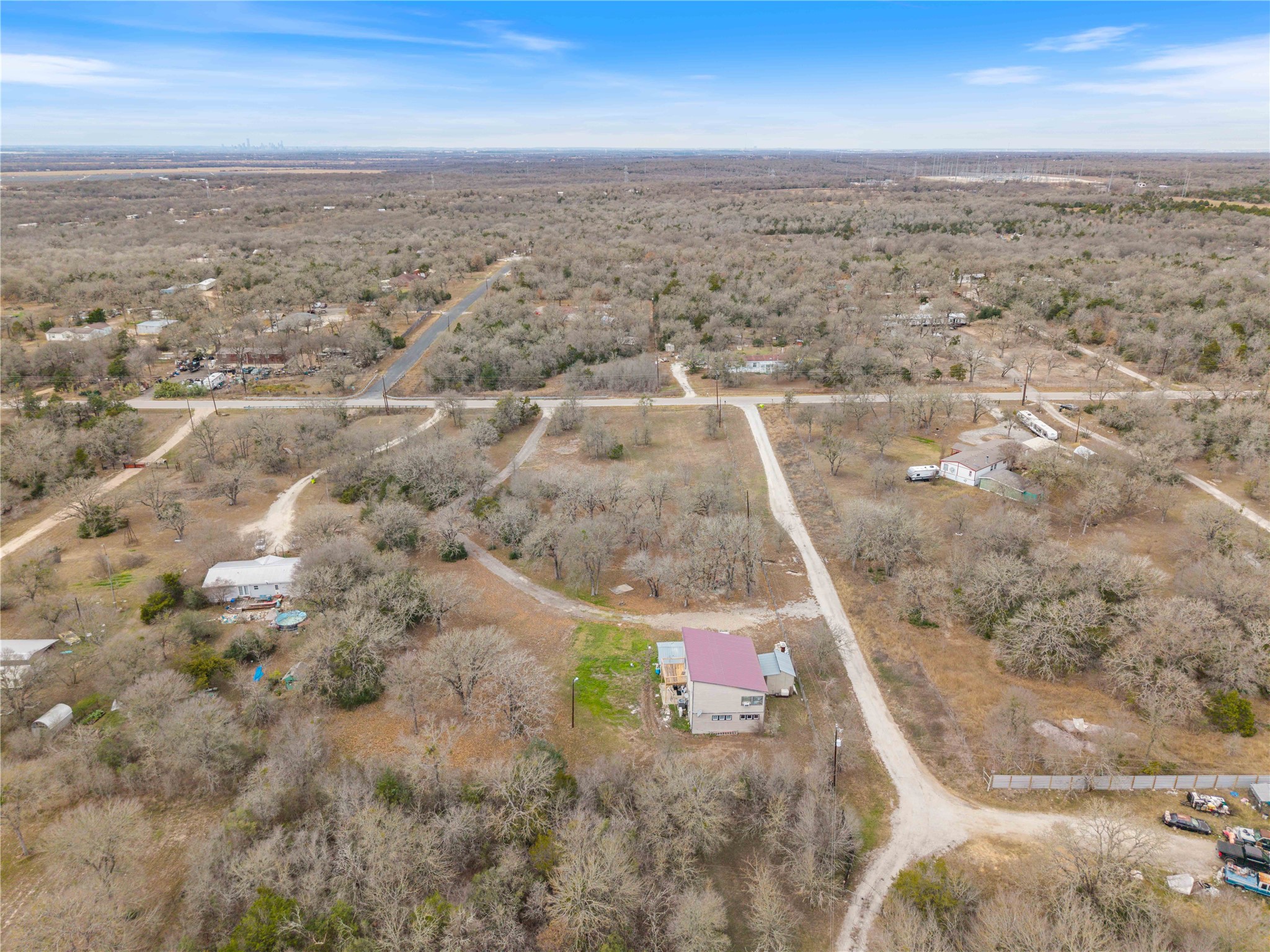 211 Webberwood Way Elgin, TX 78621 - Photo 6 of 9 an aerial view of residential houses with outdoor space