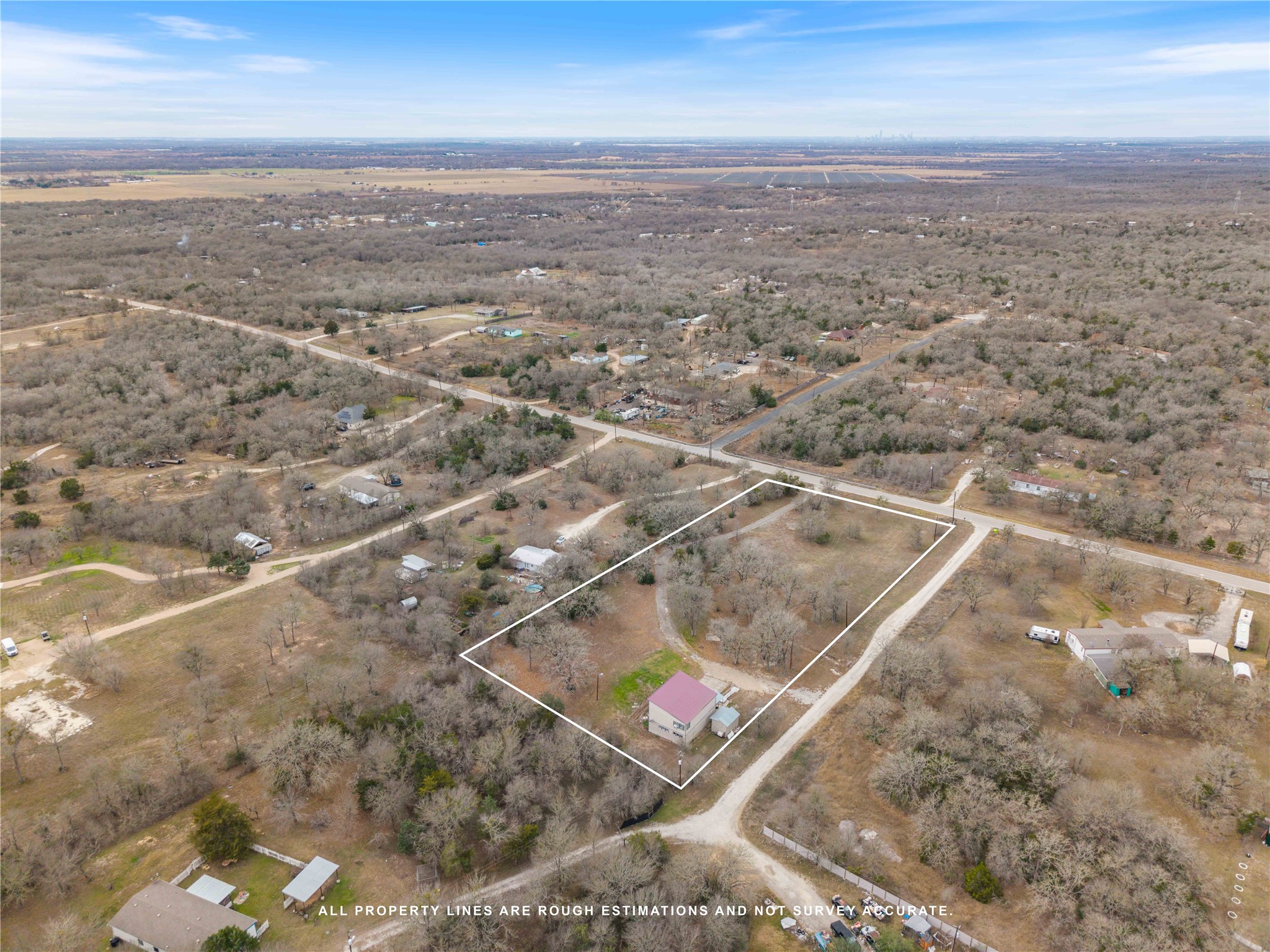 211 Webberwood Way Elgin, TX 78621 - Photo 7 of 9 an aerial view of residential houses with outdoor space