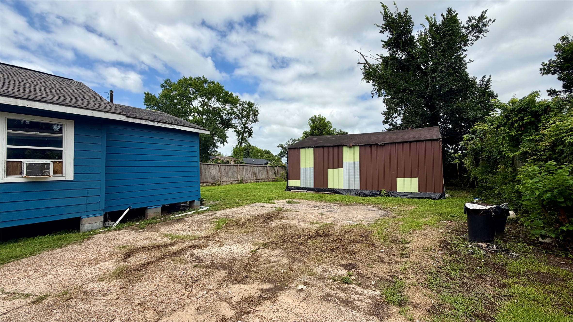 8116 Sandra Street Houston, TX 77016 - Photo 13 of 16 Long Drive with Building/Storage in back