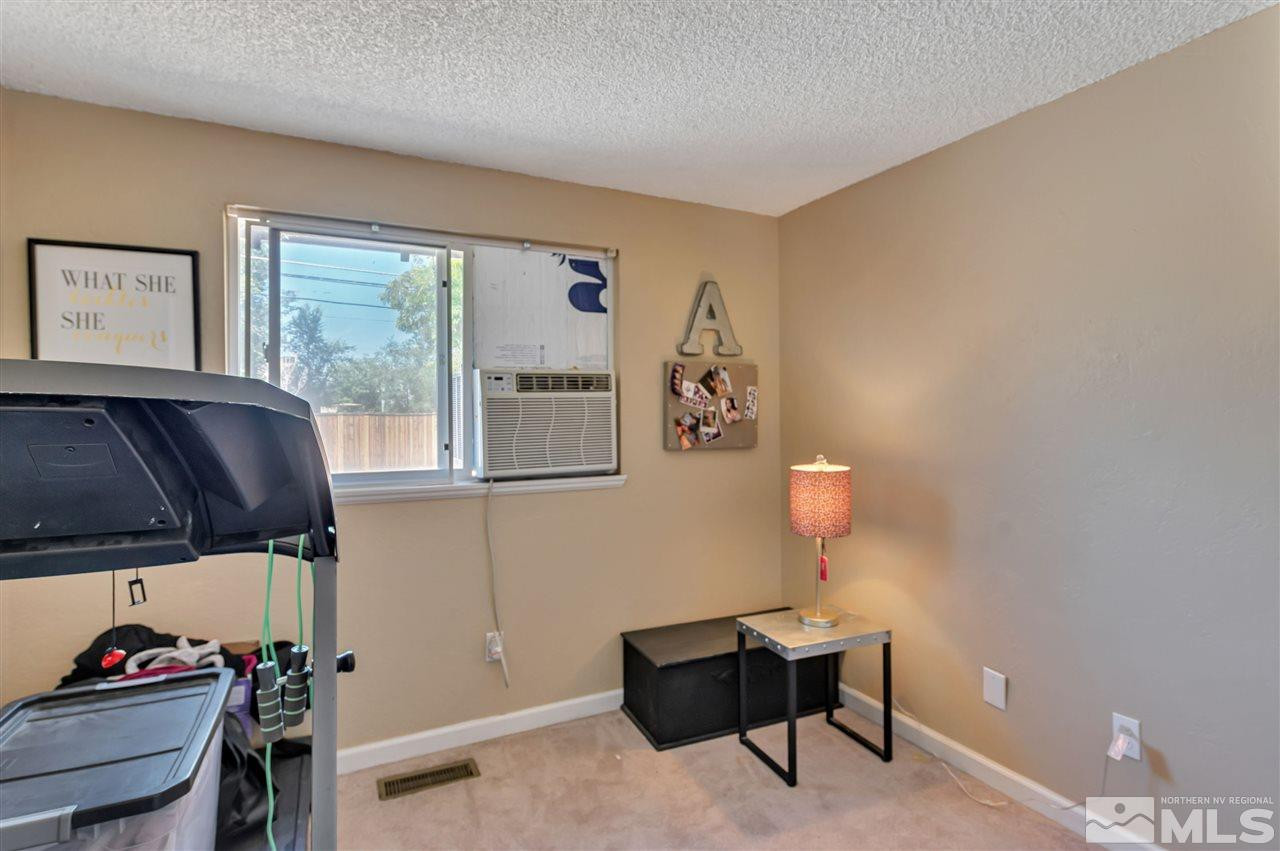 32 Gault Way Sparks, NV 89431 - Photo 15 of 26 a living room with furniture and a window