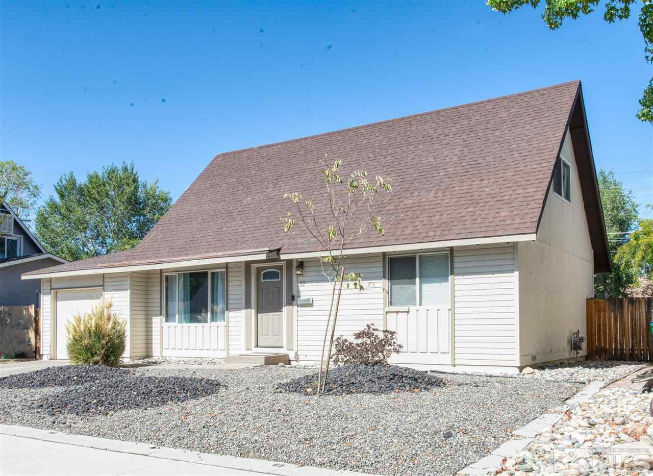 32 Gault Way Sparks, NV 89431 - Photo 2 of 26 a front view of a house with garden